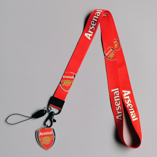 Vibrant Arsenal red lanyard: a stylish and practical gift for football fans.