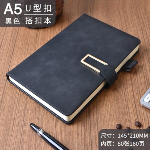 Sophisticated A5 black leather notebook with gold clasp, perfect for professionals and students.