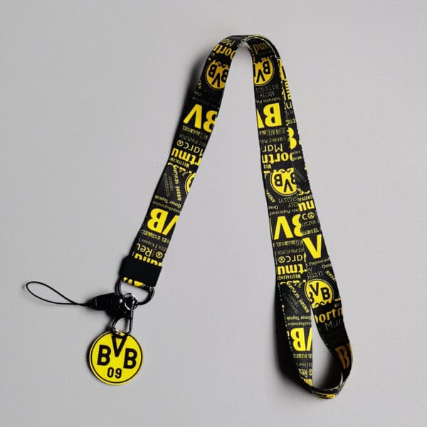 Sporty black and yellow Borussia Dortmund lanyard, perfect for fans and corporate gifts.