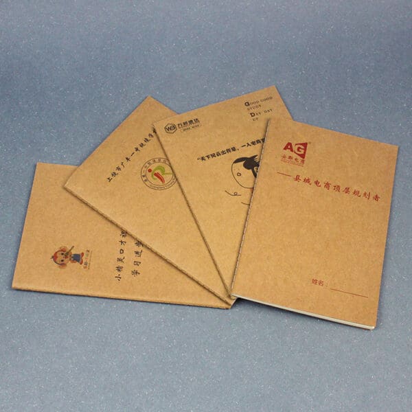Eco-friendly notebooks with kraft paper covers, perfect for sustainable corporate gifts and creative use.