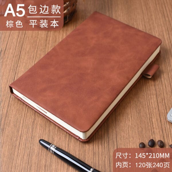 Elegant brown faux leather A5 notebook with ribbon bookmark, perfect for corporate gifts.