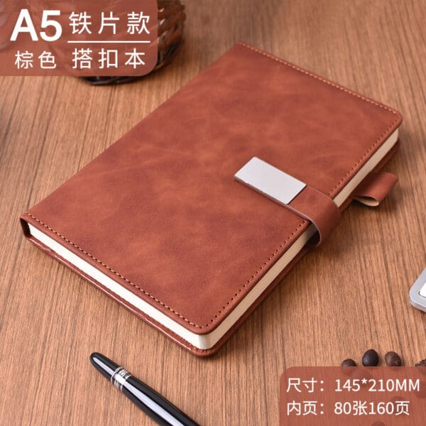 Stylish brown leather notebook with clasp, perfect for corporate gifts and note-taking.