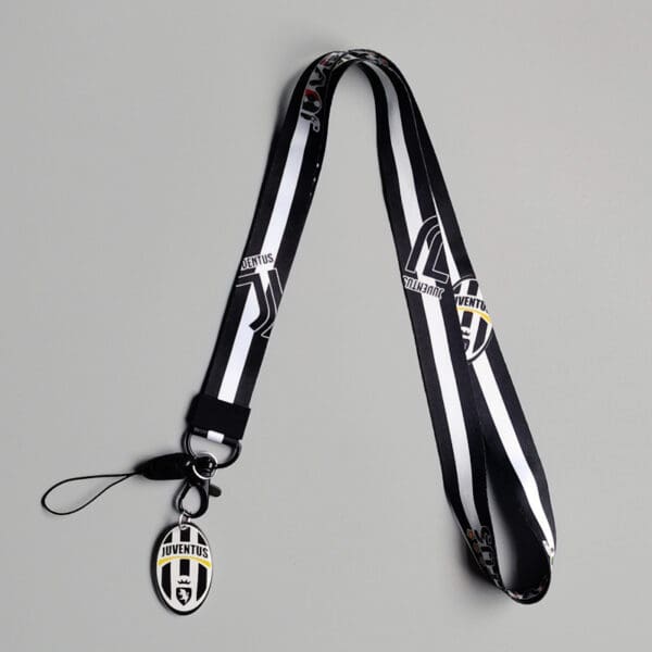 Stylish Juventus lanyard in black and white, perfect for fans and corporate gifts.