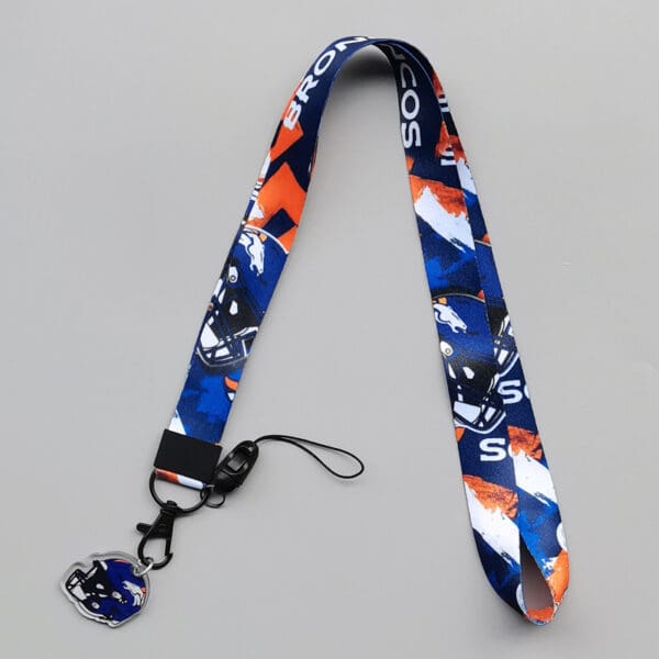 Vibrant sports lanyard with helmet charm, ideal for fans and corporate gifts.