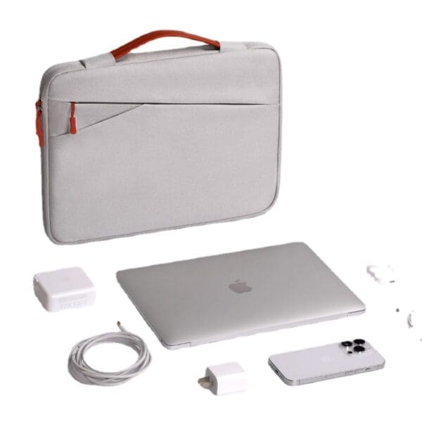 Sleek silver laptop with stylish sleeve and accessories, ideal for corporate gifts.