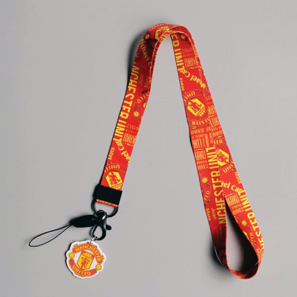 Durable Manchester United lanyard with iconic red design and clip—perfect gift for football fans.
