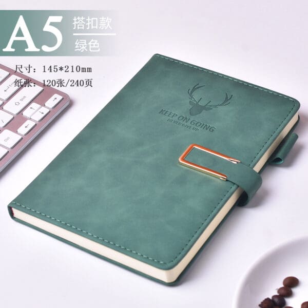 Stylish teal notebook with antlers, perfect for corporate gifting and an inviting workspace.