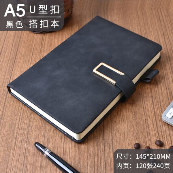 Elegant black A5 notebook with gold clasp, perfect for corporate gifts and stylish writing.