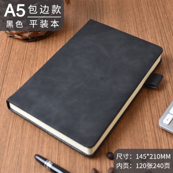 Elegant black A5 notebook with cream-lined pages, perfect for corporate gifts and personal use.