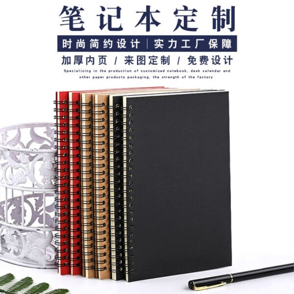 Stylish spiral notebooks and pen, perfect for corporate gifts and professional use.