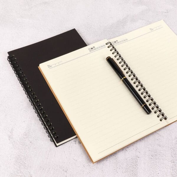 Sophisticated notebooks and pen, perfect for corporate gifting and enhancing productivity.