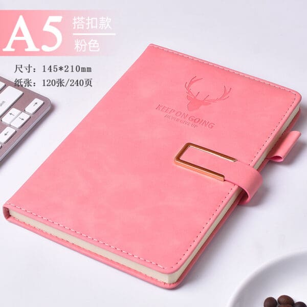 Chic pink leather notebook with embossed design, perfect for corporate gifts and stylish workspaces.