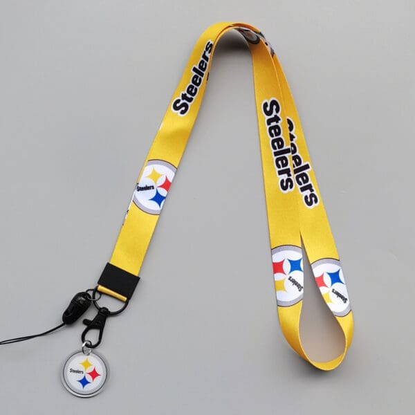 Vibrant Pittsburgh Steelers lanyard for fans, featuring logo and sturdy clip for keys and IDs.