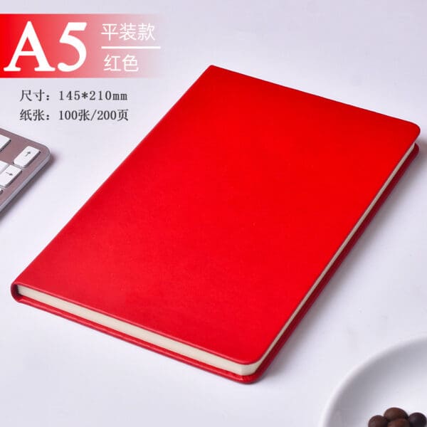 Vibrant red A5 notebook, ideal for corporate gifts and creative note-taking in professional settings.