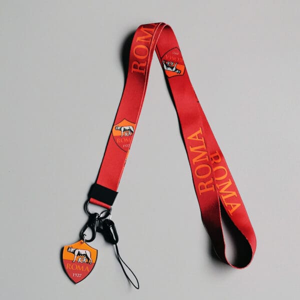 Vibrant red Roma lanyard with wolf logos, perfect for corporate gifts and events.