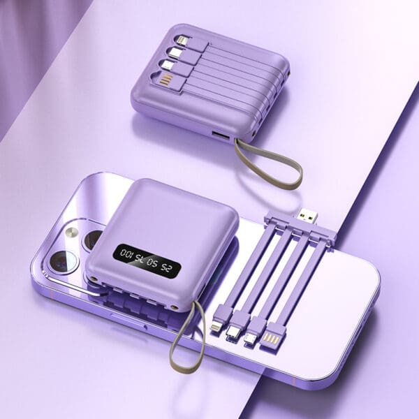 Modern smartphone charging setup with a purple power bank, organized cables, and sleek design.