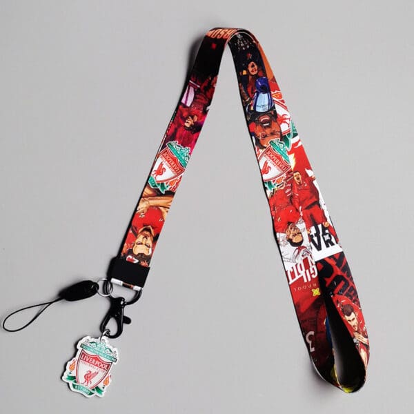 Bold red sports lanyard with dynamic graphics and detachable clip for fans everyday use.